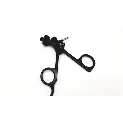 Black surgical instrument with ergonomic handles and precision tip featuring karl storz clickline metal handle design