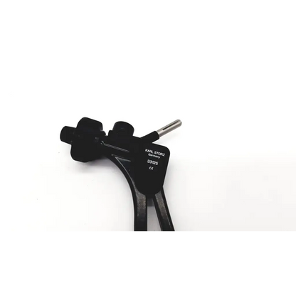 Black karl storz 33125 surgical instrument with metallic tip and ergonomic clickline metal handle design