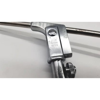 Silver metallic karl storz holder rotating arm sewing machine presser foot with engraved markings and knurled adjustment knob