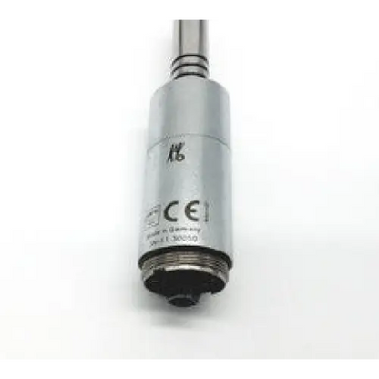 Silver cylindrical intralux dental handpiece motor with threaded metallic shaft and black end cap marked ce made in germany