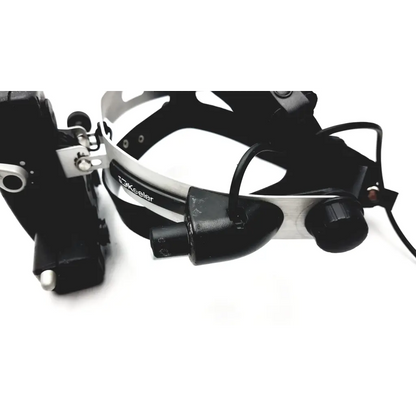 Black and silver Keeler Vantage Plus binocular indirect ophthalmoscope with head-mounted surgical light and adjustable arm