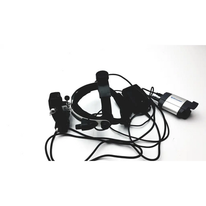 Black and silver keeler vantage plus led bio surgical headlight with adjustable straps and compact power unit