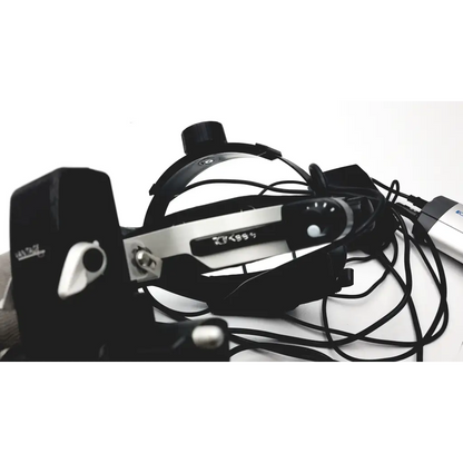 Black and silver keeler vantage plus led bio surgical headlight with adjustable straps and circular lens assembly