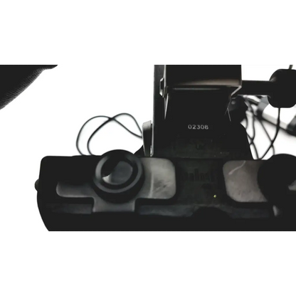 Black metal camera mount with engraved serial number 02308 for keeler vantage plus led bio ophthalmoscope