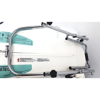 Chrome-finished metal boat rod holder with black rubber grips and teal safety labels on kinetec optima ability one motion machine tank
