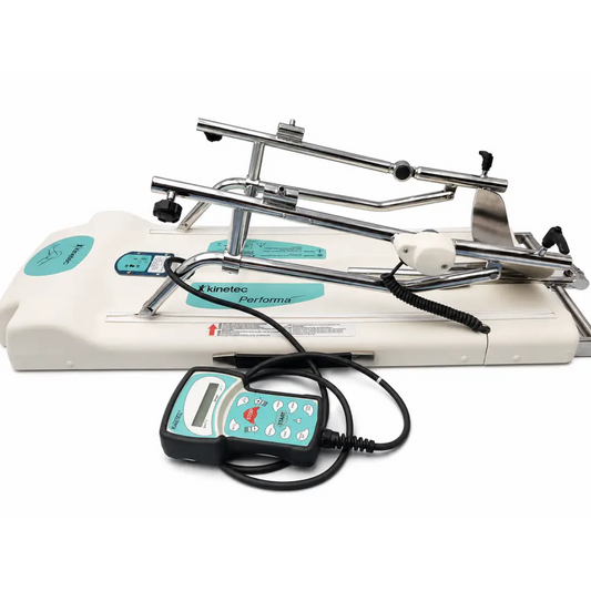Kinetec Performa cpm machine with chrome frame, white base, teal control panel, and black coiled cable