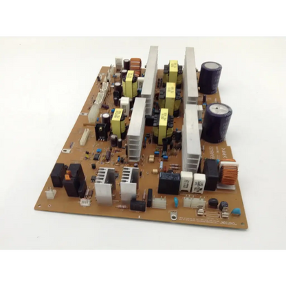 Brown konica minolta 7165 copier dc power source board with yellow and black capacitors and white heat sinks