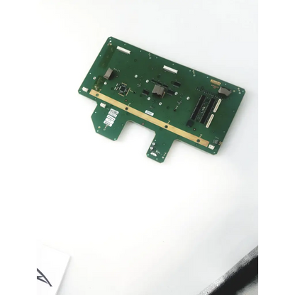 Green rectangular kontron medical 42p0110 circuit board with gold traces and electronic components mounted on it