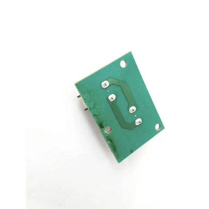 Green rectangular circuit board with silver soldered components and curved copper trace in kortek kt-lm150xd ac power rev 01