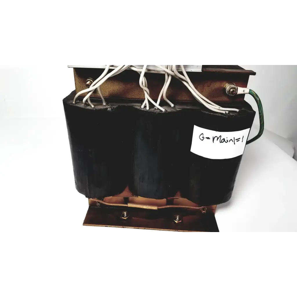 Black cylindrical power transformer by kowa sangyo with copper windings and white wiring labeled g-main=1 for reuse medical