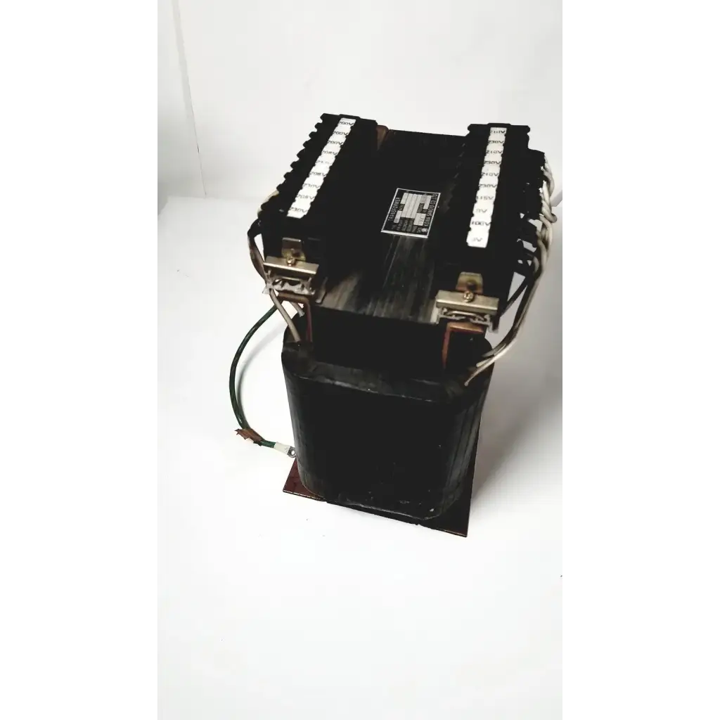 Black industrial power transformer with copper windings and terminal blocks by kowa sangyo for reuse medical applications