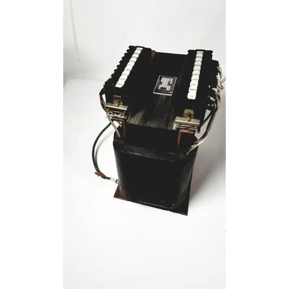 Black industrial power transformer with copper windings and terminal blocks by kowa sangyo for reuse medical applications