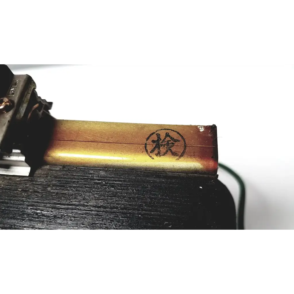 Golden metallic kowa sangyo co ltd transformer with circular stamp featuring chinese character檢 for power transformers reuse medical use