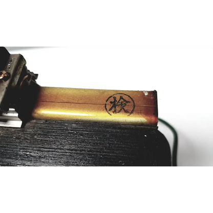 Golden metallic kowa sangyo co ltd transformer with circular stamp featuring chinese character檢 for power transformers reuse medical use