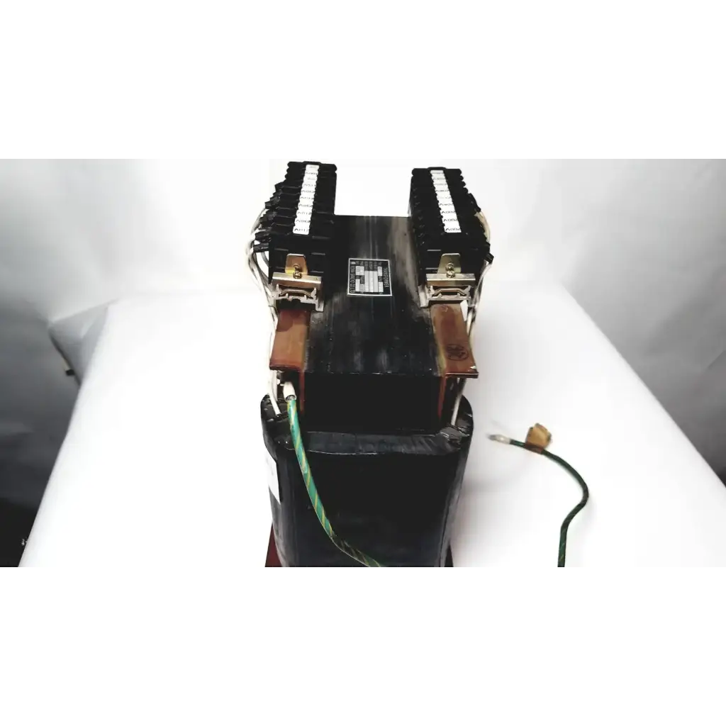 Black industrial power transformer by kowa sangyo with dual terminal blocks and copper-colored clamps for reuse medical use