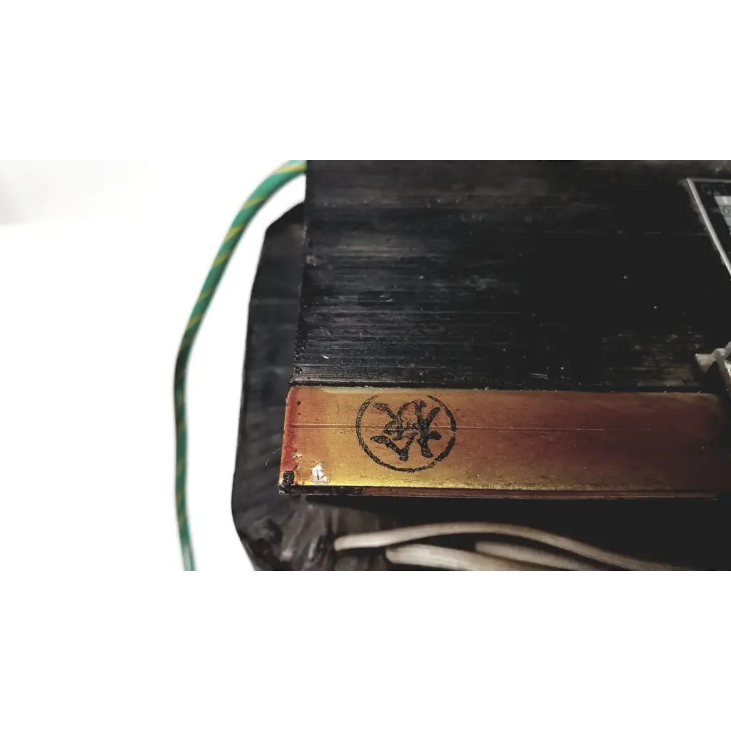 Black rectangular kowa sangyo power transformer with gold metallic strip and embossed circular logo for reuse medical use