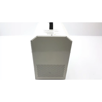 Silver metallic laerdal dss 110-2 air compressor with perforated front panel and black handle industrial-grade design