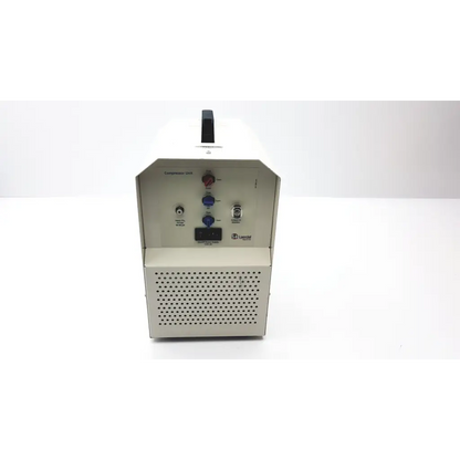 White metal laerdal dss 110-2 air compressor with perforated front panel and control knobs for efficient airflow