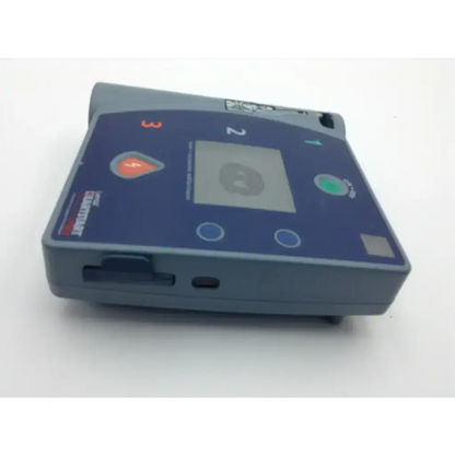 Blue and gray laerdal heartstart fr2 defibrillator with digital screen orange and green buttons and zoll logo on side