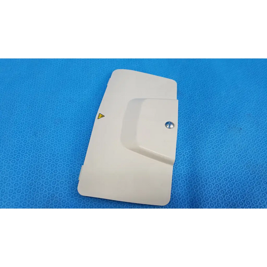 Off-white plastic lamp house cover panel with silver screw and yellow warning triangle for topcon trc-nw6s retinal camera