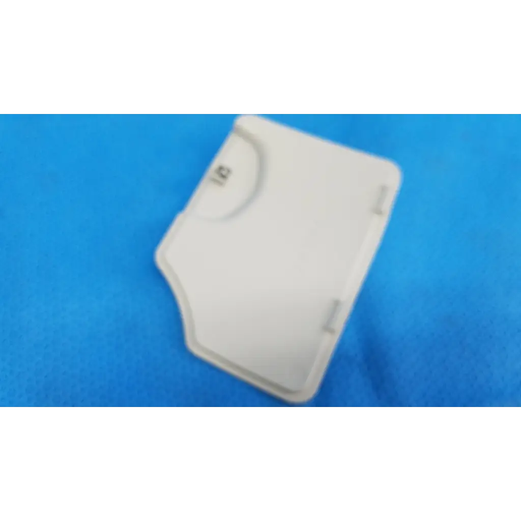 White plastic lamp house cover panel with molded edges and metallic latch for Topcon TRC-NW8 retinal camera