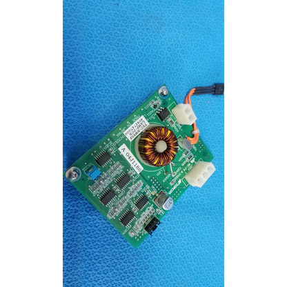 Green illumination circuit board with central toroidal copper inductor and black integrated circuits for topcon retinal camera