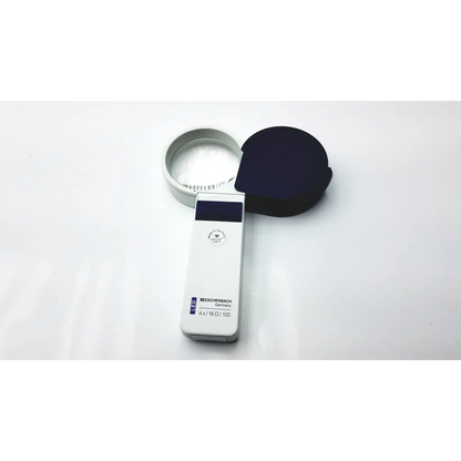 White handheld LED Eschenbach 4x 16d magnifying glass with silver rim and black cap branded Beschenbach Germany bbhd3-6