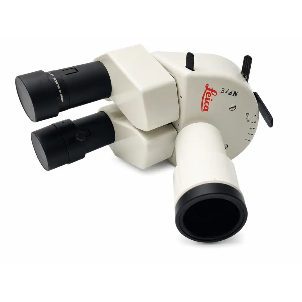 Leica nf/e surgical microscope with cream body and black eyepieces featuring biomed certified phototube attachment