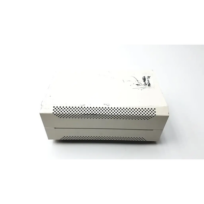 White plastic xbox 360 console with perforated ventilation grilles featuring lej mbq 52ac supply ballast power supply ballast