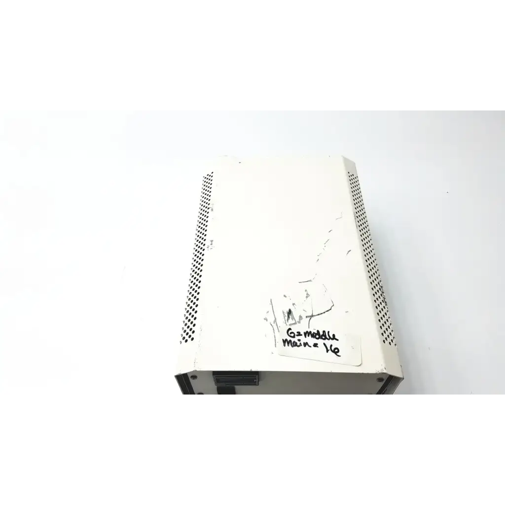 White rectangular power supply ballast lej mbq 52ac-z 310.26j with perforated sides and handwritten label on surface