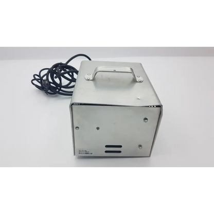 Silver metallic rectangular lester electrical lestronic ii fully automatic battery charger with handle and black coiled cord