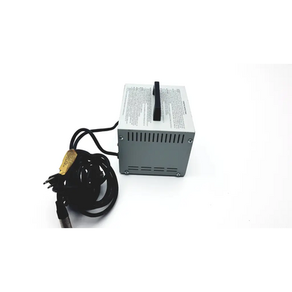Gray rectangular lester electronics 24 volt dual mode automatic battery charger with black handle and coiled cord