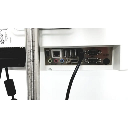 The back panel of a white lidco hm-81-01 rapid hemodynamic monitor with power supply showing multiple ports
