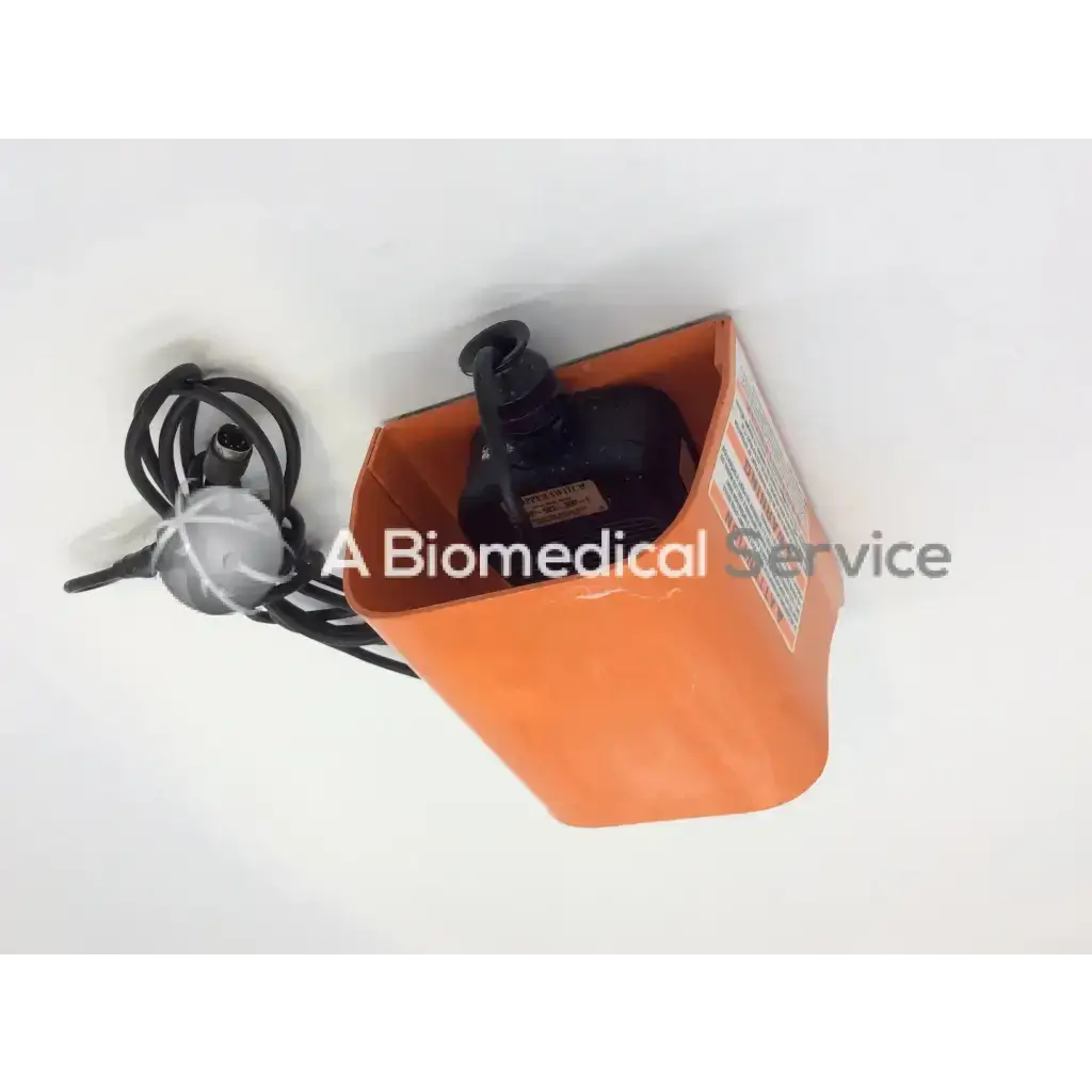 Orange waterproof bag containing black line master guard foot pedal device and coiled cable for secure use