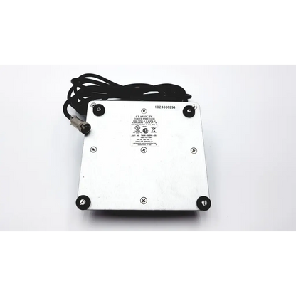 Silver rectangular linemaster switch corporation claasic iv foot switch with black cord and mounting feet for hands-free control