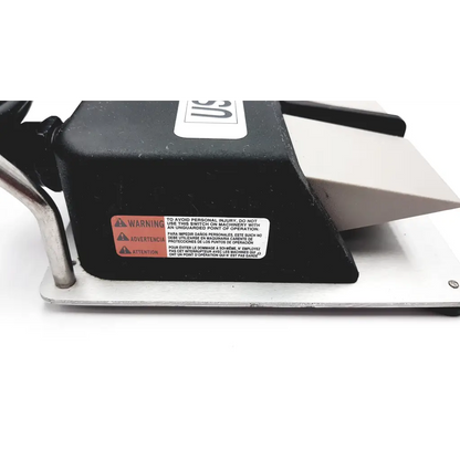 Black plastic and metal linemaster switch corporation claasic iv foot switch with warning label for industrial use