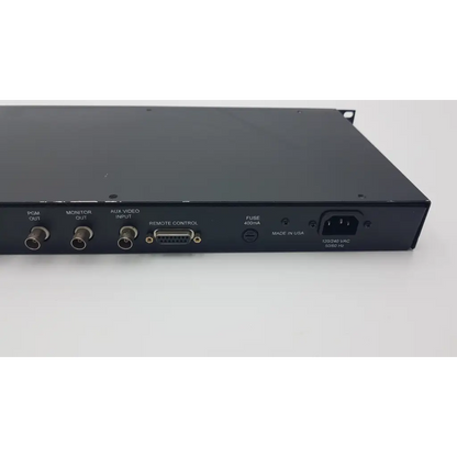 Black metal rack-mount video switcher with bnc and d-sub connectors shown from back side in link electronics prc-970 proc amp