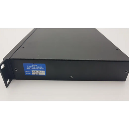 Black metal rack-mountable proc amp with blue prc-37c label by link electronics prc-970 for professional audio use