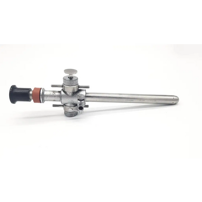 Silver linvatec conmed hasson laparoscopic trumpet valve with black eyepiece orange seal and metallic adjustment knobs