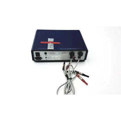 Dark blue rectangular lkb bromma 2015 pulsaphor plus control unit with black ports and red and black cables back side
