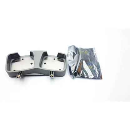 Gray plastic m3542-41001 paddle tray dashboard mounting bracket with metallic inserts and silver foil packaging