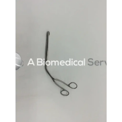 Metallic surgical magill sbh05190-255 forceps with curved elongated arms and circular finger loops in silver color