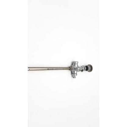 Silver-colored mahe 13.000.05 5.5mm surgical instrument with slender shaft and complex jointed head featuring multiple ports
