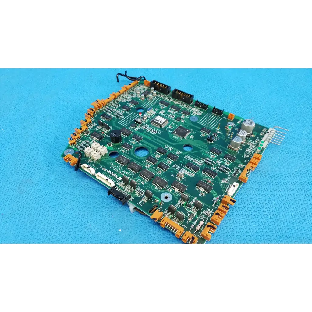 Green motherboard circuit board with orange connectors and electronic components for topcon trc-nw6s retinal camera