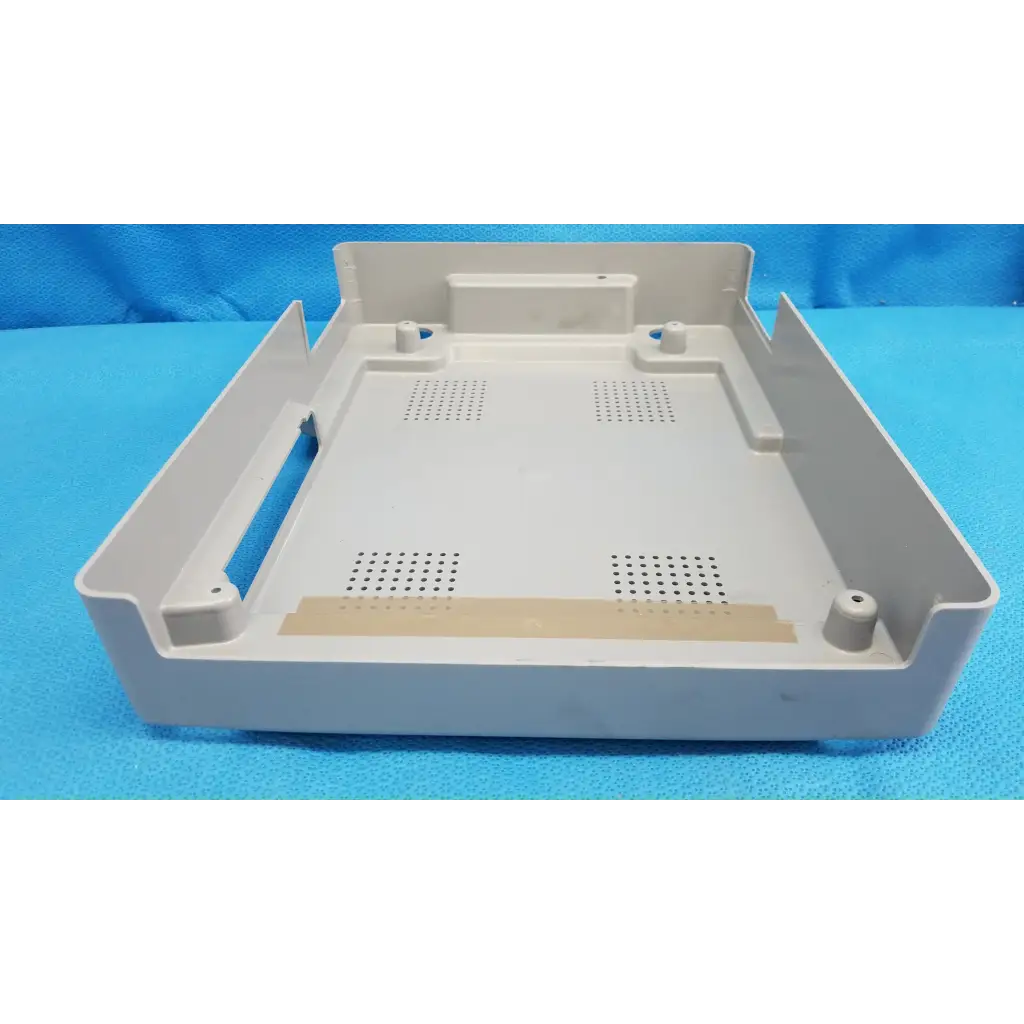 Light gray plastic main unit bottom cover panel with molded edges and ventilation for topcon trc-nw8 retinal camera