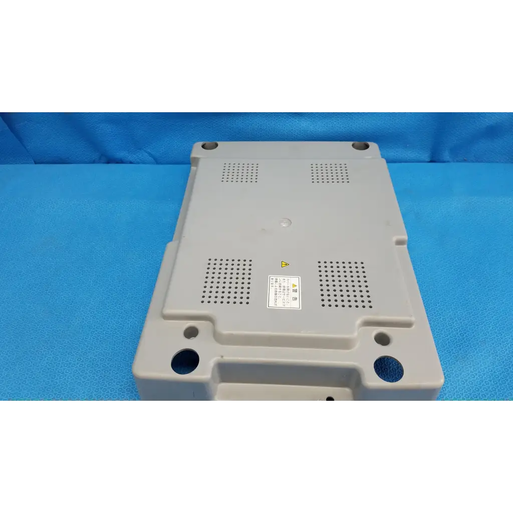 Gray plastic main unit cover panel with ventilation panels and mounting holes for topcon trc-nw8 retinal camera back side