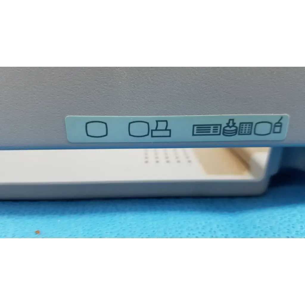 Light gray plastic main unit bottom cover panel with light blue care label for topcon trc-nw8 retinal camera