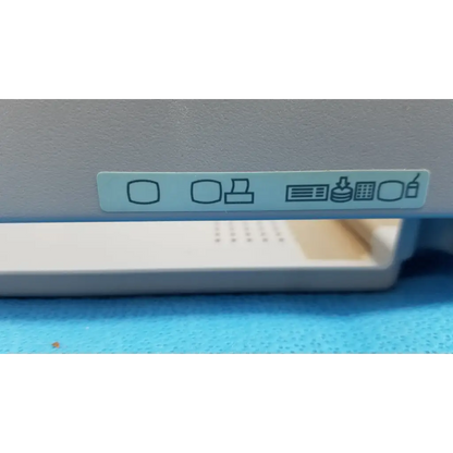 Light gray plastic main unit bottom cover panel with light blue care label for topcon trc-nw8 retinal camera