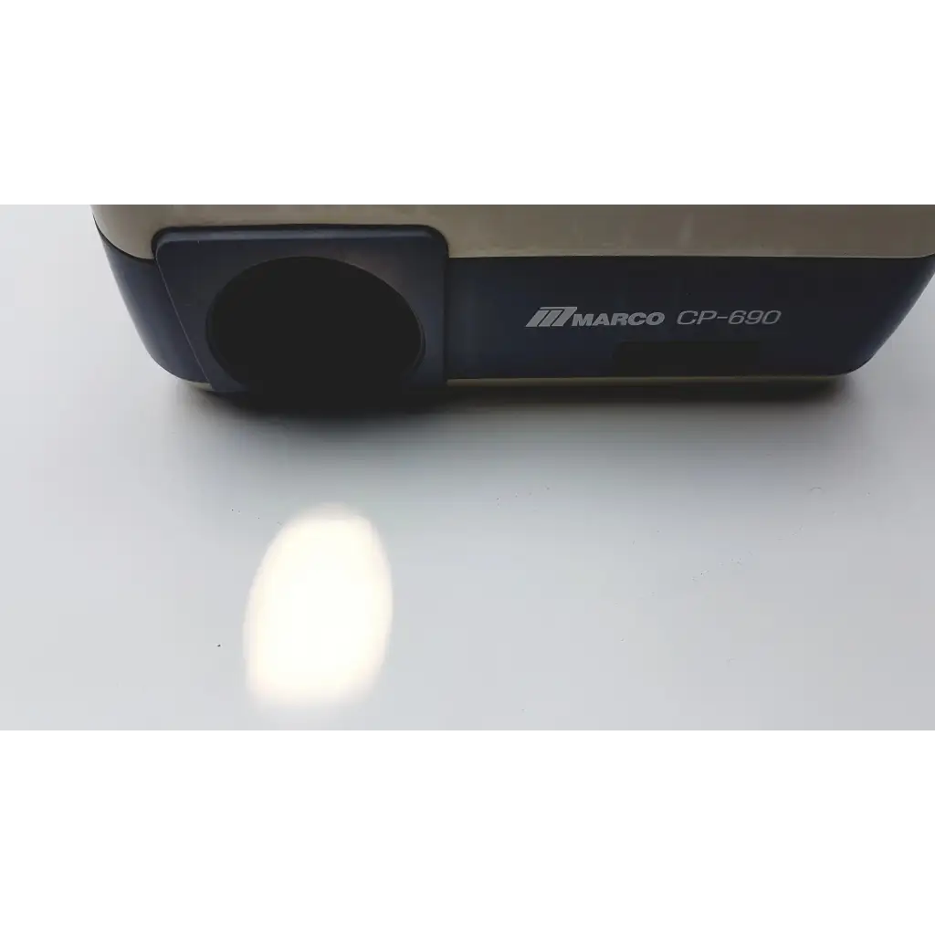 Beige and navy blue marco cp-690 auto chart projector with circular front lens for marine navigation use