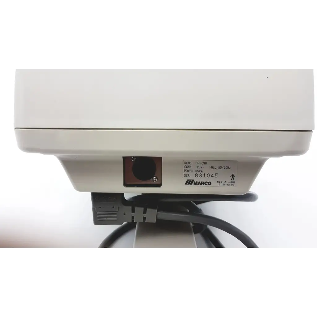 White plastic marco cp-690 auto chart projector showing black power cord and input port on the back side